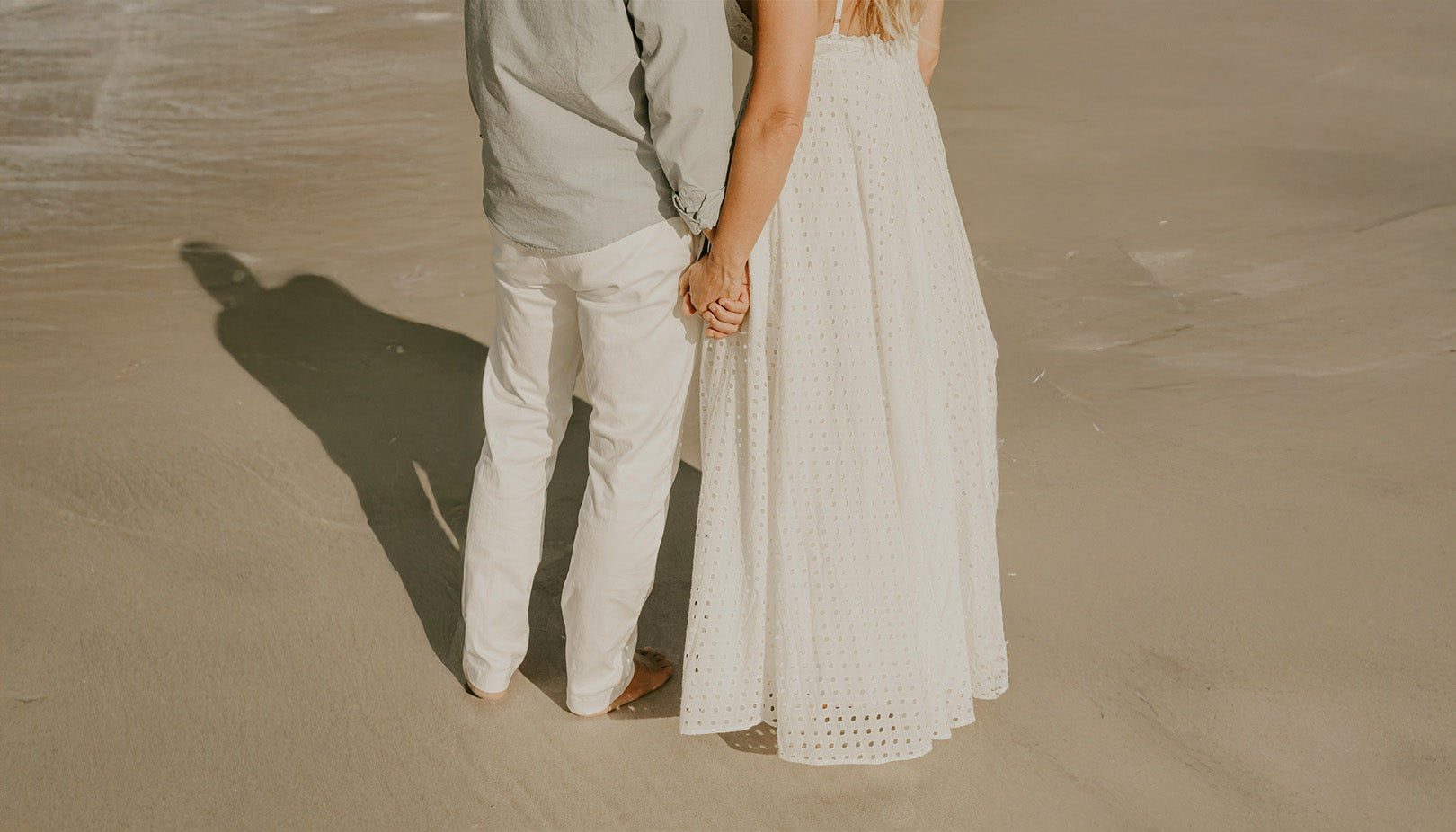A couple Holding hands on the each living the Olairo lifestyle