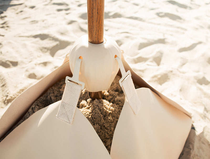 Luxury beach umbrellas with UPF 50+ protection and wind-resistant design. Elevated coastal style made for long, effortless days by the sea.