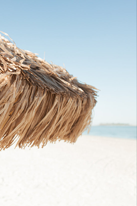 Close-up of The Sirocco - a natural Inspired high-end beach ubrella