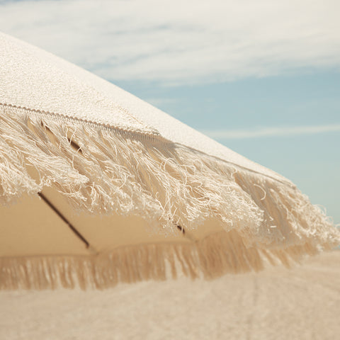 Luxury beach umbrellas with UPF 50+ protection and wind-resistant design. Elevated coastal style made for long, effortless days by the sea.